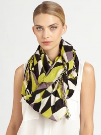 Trimmed in allover fringe, this vibrant, kaleidoscope-printed wrap has a little edge.Viscose44 X 78Hand washImported