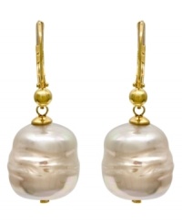 From the island of Mallorca, Spain, these white baroque organic man-made pearl (12 mm) drop earrings are set in 18k gold over sterling silver and feature a 14k gold post. Approximate drop: 1/2 inch.