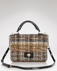 This kate spade new york satchel refines the textured trend in tweed with glossy leather trims, making it a must carry for the lady who luxes. This kate spade new york satchel refines the textured trend in tweed with glossy leather trims, making it a must carry for the lady who luxes.