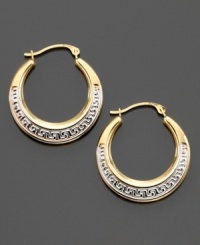 An age-old design symbolizing infinity and unity, the Greek key design looks decadent on these hoop earrings crafted in yellow and white 14k gold. Approximate diameter: 1/2 inch. An age-old design symbolizing infinity and unity, the Greek key design looks decadent on these hoop earrings crafted in yellow and white 14k gold. Approximate diameter: 1/2 inch.