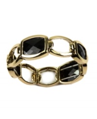 Get classic style with this chic cuff. AK Anne Klein bracelet features an effortless stretch design highlighting faceted, jet plastic beads set in gold tone mixed metal. Approximate diameter: 2-1/4 inches.