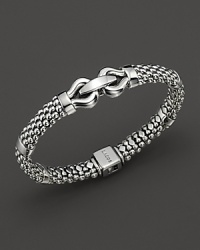 Sterling silver bracelet with intricate details--just right for stacking. Sterling silver bracelet with intricate details--just right for stacking.