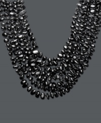 Let eight luxurious layers adorn your neckline. Silky onyx chips (6-8 mm) form eight graduated strands that make a bold, stylish statement. Approximate length: 18 inches. Let eight luxurious layers adorn your neckline. Silky onyx chips (6-8 mm) form eight graduated strands that make a bold, stylish statement. Approximate length: 18 inches.
