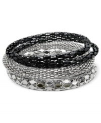 Stackable fun, by GUESS. These eye-catching bangle bracelets feature exotic textures and black jet plating for easy cool. Crafted in imitation rhodium and sprayed jet mixed metal. Approximate diameter: 2-1/2 inches. Stackable fun, by GUESS. These eye-catching bangle bracelets feature exotic textures and black jet plating for easy cool. Crafted in imitation rhodium and sprayed jet mixed metal. Approximate diameter: 2-1/2 inches.