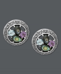 Ocean-inspired design. Genevieve & Grace's unique circular stud earrings feature a pretty pool of color, including blue topaz (5/8 ct. t.w.), amethyst (2/3 ct. t.w.) and abalone encircled by marcasite. Post backing and setting crafted in sterling silver. Approximate diameter: 5/8 inch. Ocean-inspired design. Genevieve & Grace's unique circular stud earrings feature a pretty pool of color, including blue topaz (5/8 ct. t.w.), amethyst (2/3 ct. t.w.) and abalone encircled by marcasite. Post backing and setting crafted in sterling silver. Approximate diameter: 5/8 inch.