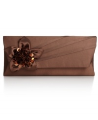An elegant evening out deserves exquisite accessorizing, like this satin-wrapped silhouette from La Regale. Adorned with a beautiful beaded flower, it gives your LBD a femme fatale feel. An elegant evening out deserves exquisite accessorizing, like this satin-wrapped silhouette from La Regale. Adorned with a beautiful beaded flower, it gives your LBD a femme fatale feel.