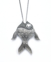 Make a splash with this scaly style! Bar III's large fish pendant makes a bold, summery statement all year round. Pendant features an intricate textured design crafted from burnished silver tone mixed metal. Approximate length: 28 inches + 3-inch extender. Approximate drop: 3 inches. Make a splash with this scaly style! Bar III's large fish pendant makes a bold, summery statement all year round. Pendant features an intricate textured design crafted from burnished silver tone mixed metal. Approximate length: 28 inches + 3-inch extender. Approximate drop: 3 inches.