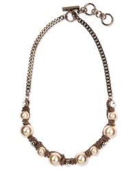 Givenchy's gorgeous necklace design combines imitation pearls and sparkling crystals in a stylish frontal setting. Crafted in brown gold tone mixed metal. Approximate length: 16 inches + 2-inch extender. Givenchy's gorgeous necklace design combines imitation pearls and sparkling crystals in a stylish frontal setting. Crafted in brown gold tone mixed metal. Approximate length: 16 inches + 2-inch extender.