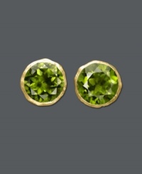 For a classic look with a slight pop of color, Studio Silver's chic stud earrings will do just the trick. Crafted from 18k gold over sterling silver, round-cut green glass adds an envy-inducing touch. Approximate diameter: 1/2 inch. For a classic look with a slight pop of color, Studio Silver's chic stud earrings will do just the trick. Crafted from 18k gold over sterling silver, round-cut green glass adds an envy-inducing touch. Approximate diameter: 1/2 inch.