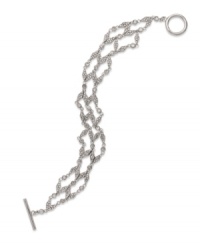 With a diamond deco design, this glitzy bracelet form Lauren Ralph Lauren adds a luminous touch with pave accents. Crafted in rhodium-plated brass. Approximate length: 7-1/2 inches. With a diamond deco design, this glitzy bracelet form Lauren Ralph Lauren adds a luminous touch with pave accents. Crafted in rhodium-plated brass. Approximate length: 7-1/2 inches.