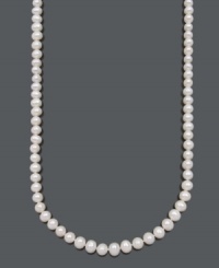 The key to classic style is a chic strand of pearls. Belle de Mer necklace features cultured freshwater pearls (9-10 mm) with a 14k gold clasp. Approximate length: 30 inches. The key to classic style is a chic strand of pearls. Belle de Mer necklace features cultured freshwater pearls (9-10 mm) with a 14k gold clasp. Approximate length: 30 inches.