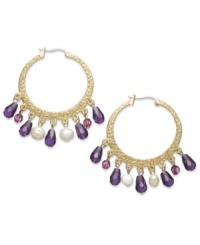 Head-turning elegance from Lauren Ralph Lauren. These textured hoop earrings take a modern approach with colorful beads fashioned from resin and glass. Crafted in 14k worn gold-plated brass. Approximate drop: 1-1/2 inches. Approximate diameter: 1-1/4 inches. Head-turning elegance from Lauren Ralph Lauren. These textured hoop earrings take a modern approach with colorful beads fashioned from resin and glass. Crafted in 14k worn gold-plated brass. Approximate drop: 1-1/2 inches. Approximate diameter: 1-1/4 inches.