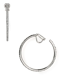 Classically styled hoop earrings from Lauren Ralph Lauren are a jewel box staple, cast in silver tone plated metal with a subtle rim of cubic zirconia sparkle. Classically styled hoop earrings from Lauren Ralph Lauren are a jewel box staple, cast in silver tone plated metal with a subtle rim of cubic zirconia sparkle.