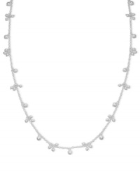 Perfect with a white blouse, even better doubled up with a little black dress. Long necklace by Lauren Ralph Lauren features clusters of silvertone beads. Crafted in mixed metal. Approximate length: 36 inches. Perfect with a white blouse, even better doubled up with a little black dress. Long necklace by Lauren Ralph Lauren features clusters of silvertone beads. Crafted in mixed metal. Approximate length: 36 inches.