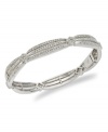 Triple the glamour. Eliot Danori's glistening bangle bracelet features a three row design accented by sparkling glass crystals. Set in rhodium-plated mixed metal. Approximate diameter: 2-1/4 inches.
