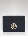 A poised piece for any girl on the go, this leather Tory Burch card case has four easy-access slots for your cards.