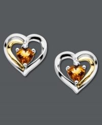 Sweet romance. Petite stud earrings feature heart-shaped citrine (7/8 ct. t.w.) and a diamond accent for extra sparkle. Set in 14k gold and sterling silver. Approximate diameter: 1/2 inch. Sweet romance. Petite stud earrings feature heart-shaped citrine (7/8 ct. t.w.) and a diamond accent for extra sparkle. Set in 14k gold and sterling silver. Approximate diameter: 1/2 inch.