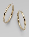 A simply chic style in radiant 18k hammered gold. 18k goldLength, about 1½Post backMade in Italy