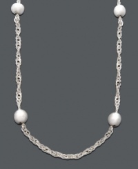 Create a look of simplistic style by wearing this chain solo, or pair it with other necklaces for a chic, layered look. Giani Bernini puts a delicate twist on the Singapore chain with polished, bead details. Crafted in sterling silver. Approximate length: 20 inches. Create a look of simplistic style by wearing this chain solo, or pair it with other necklaces for a chic, layered look. Giani Bernini puts a delicate twist on the Singapore chain with polished, bead details. Crafted in sterling silver. Approximate length: 20 inches.