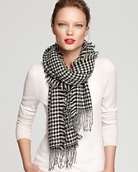Lauren Ralph Lauren's affinity for combining classic style with modern details is embodied in this sequined houndstooth scarf. Lauren Ralph Lauren's affinity for combining classic style with modern details is embodied in this sequined houndstooth scarf.
