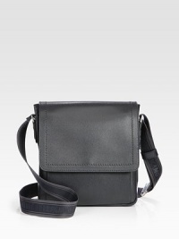 Remarkably crafted and shaped for the modern man of style, in lightly pebbled calfskin leather with logo strap detail.Magnetic flap closureAdjustable shoulder strapExterior, interior zip pocketsFully linedLeather26W x 28H x 2DMade in Italy Remarkably crafted and shaped for the modern man of style, in lightly pebbled calfskin leather with logo strap detail.Magnetic flap closureAdjustable shoulder strapExterior, interior zip pocketsFully linedLeather26W x 28H x 2DMade in Italy