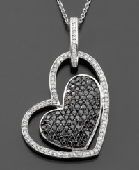 Love shines in every shade. This diamond heart necklace from Caviar by Effy Collection features black and white diamonds (7/8 ct. t.w.) set in 14k white gold. Approximate length: 18 inches. Approximate drop: 1-1/4 inches. Love shines in every shade. This diamond heart necklace from Caviar by Effy Collection features black and white diamonds (7/8 ct. t.w.) set in 14k white gold. Approximate length: 18 inches. Approximate drop: 1-1/4 inches.