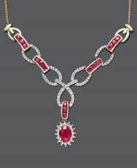 Turn heads with dazzling color and spectacular design. Necklace features oval and round-cut rubies (2 ct. t.w.) and interlocking links decorated in sparkling diamonds (1/2 ct. t.w.). Toggle style necklace crafted in 14k gold. Approximate length: 18 inches. Approximate drop: 2-1/2 inches. Turn heads with dazzling color and spectacular design. Necklace features oval and round-cut rubies (2 ct. t.w.) and interlocking links decorated in sparkling diamonds (1/2 ct. t.w.). Toggle style necklace crafted in 14k gold. Approximate length: 18 inches. Approximate drop: 2-1/2 inches.