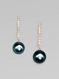 A dazzling and chic design with Akoya pearls accented with brilliant diamonds set in 18k gold. 7.5mm white, round, Akoya pearlsDiamonds, .08 tcw18k goldDrop, 1Lever backImported A dazzling and chic design with Akoya pearls accented with brilliant diamonds set in 18k gold. 7.5mm white, round, Akoya pearlsDiamonds, .08 tcw18k goldDrop, 1Lever backImported