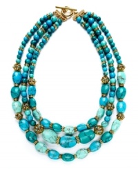 A seasonal necessity. Lauren Ralph Lauren's cheery three-row necklace features reconstituted turquoise beads and openwork metal accents. Ring and toggle closure. Crafted in 14k gold-plated mixed metal. Approximate length: 22 inches. A seasonal necessity. Lauren Ralph Lauren's cheery three-row necklace features reconstituted turquoise beads and openwork metal accents. Ring and toggle closure. Crafted in 14k gold-plated mixed metal. Approximate length: 22 inches.