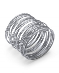 Layer up all at once! Bar III's unique bracelet combines multiple rows of textured silver tone mixed metal into one fabulous style. Approximate diameter: 2-1/2 inches to 2-3/4 inches. Layer up all at once! Bar III's unique bracelet combines multiple rows of textured silver tone mixed metal into one fabulous style. Approximate diameter: 2-1/2 inches to 2-3/4 inches.