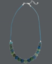 Ocean hues. Avalonia Road's destination-inspired necklace features teal and green fire agate beads (32 ct. t.w.) strung from a blue cord. Clasp and extension chain crafted from sterling silver. Approximate length: 18 inches + 2-inch extender. Ocean hues. Avalonia Road's destination-inspired necklace features teal and green fire agate beads (32 ct. t.w.) strung from a blue cord. Clasp and extension chain crafted from sterling silver. Approximate length: 18 inches + 2-inch extender.