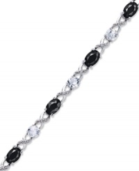 Embrace some glamour now and then. This pretty crisscross patterned bracelet highlights oval-cut onyx (3-1/3 ct. t.w.), round-cut white topaz (2-3/8 ct. t.w.) and sparkling diamond accents. Approximate length: 7-1/2 inches. Embrace some glamour now and then. This pretty crisscross patterned bracelet highlights oval-cut onyx (3-1/3 ct. t.w.), round-cut white topaz (2-3/8 ct. t.w.) and sparkling diamond accents. Approximate length: 7-1/2 inches.