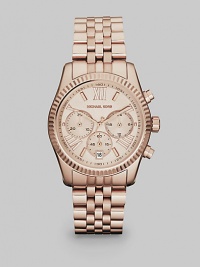 The warm glow and rich elegace of a rose goldtone finish and high-tech chronograph performance give this stunning watch its timeless appeal.Quartz movementWater resistant to 10 ATMRose goldtone stainless steel round case, 38mm diameter (1.5)Textured bezelRose goldtone dialOversized Roman numerals and bar hour markersSecond handThree chronograph sub dialsDate window at 6:00Textured link braceletImported The warm glow and rich elegace of a rose goldtone finish and high-tech chronograph performance give this stunning watch its timeless appeal.Quartz movementWater resistant to 10 ATMRose goldtone stainless steel round case, 38mm diameter (1.5)Textured bezelRose goldtone dialOversized Roman numerals and bar hour markersSecond handThree chronograph sub dialsDate window at 6:00Textured link braceletImported