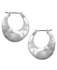 Sculptured style. Kenneth Cole New York's free form hoop earrings have an artistic aesthetic. Crafted in silver tone mixed metal. Approximate drop: 1 inch. Approximate diameter: 3/4 inch.