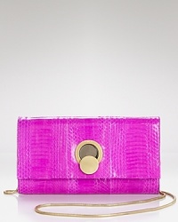DIANE von FURSTENBERG's retro swag is right for night with this genuine watersnake clutch. Tuck it under your arm to make every outfit coolly complete. DIANE von FURSTENBERG's retro swag is right for night with this genuine watersnake clutch. Tuck it under your arm to make every outfit coolly complete.