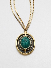 A malachite scarab pendant accented with lizard skin on a double box link chain. MalachiteLizard skinGoldtone brassLength, about 36Pendant size, about 1Lobster clasp closureMade in USA A malachite scarab pendant accented with lizard skin on a double box link chain. MalachiteLizard skinGoldtone brassLength, about 36Pendant size, about 1Lobster clasp closureMade in USA