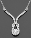 A symbol of lasting love is even prettier accented with sparkling pave diamonds (1/2 ct. t.w.). This diamond necklace is crafted in 14k white gold. Approximate length: 18 inches. Approximate drop: 1 inch.