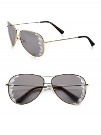 The always on-trend aviator is accented by a beautiful lace lens trim. Available in light gold with flash lens.Metal temples100% UV protectionMade in Italy The always on-trend aviator is accented by a beautiful lace lens trim. Available in light gold with flash lens.Metal temples100% UV protectionMade in Italy