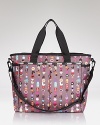 Oh baby! This nylon LeSportsac handbag is ready for your new arrival. It features a top zip closure, reinforced top handles, and pockets for the on-the-go essentials. A playful print updates this signature style.