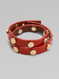 An edgy patent leather design with goldtone hardware.Patent leatherPost closureAbout 16 longImported An edgy patent leather design with goldtone hardware.Patent leatherPost closureAbout 16 longImported