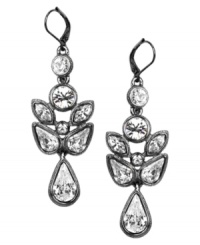 Pretty petals. The crystal glass stones on Givenchy's floral-inspired chandelier earrings ignite maximum sparkle. Set in light hematite-plated mixed metal. Approximate drop: 3-1/2 inches. Pretty petals. The crystal glass stones on Givenchy's floral-inspired chandelier earrings ignite maximum sparkle. Set in light hematite-plated mixed metal. Approximate drop: 3-1/2 inches.