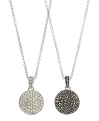 Mix and match to fit your many moods. This sparkling Judith Jack necklace features a reversible circular pendant decorated with marcasite on one side and crystal on the reverse side. Setting and chain crafted in sterling silver. Approximate length: 16 inches. Approximate drop: 1-1/4 inches. Mix and match to fit your many moods. This sparkling Judith Jack necklace features a reversible circular pendant decorated with marcasite on one side and crystal on the reverse side. Setting and chain crafted in sterling silver. Approximate length: 16 inches. Approximate drop: 1-1/4 inches.
