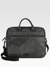 Tote your device, documents and all other essentials around town in this stylish carryall set in long-lasting nylon with an adjustable shoulder strap for maximum support and versatility.Zip closureTop handlesRemovable shoulder strapExterior, interior zip pocketsCotton liningNylon15W x 11 x 3DImported Tote your device, documents and all other essentials around town in this stylish carryall set in long-lasting nylon with an adjustable shoulder strap for maximum support and versatility.Zip closureTop handlesRemovable shoulder strapExterior, interior zip pocketsCotton liningNylon15W x 11 x 3DImported
