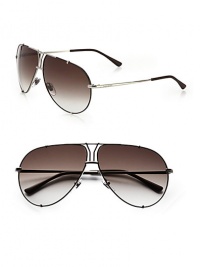 Stylish metal frames with an iconic logo between the bridge and top bar. Available in brown chocolate frames with gray gradient lenses.MetalLogo temples100% UV ProtectionMade in Italy Stylish metal frames with an iconic logo between the bridge and top bar. Available in brown chocolate frames with gray gradient lenses.MetalLogo temples100% UV ProtectionMade in Italy