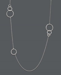 Long, light, and luminous. This delicate style by Studio Silver features interlocking rings strung from a trendy long chain. Crafted in polished sterling silver. Approximate length: 36 inches. Long, light, and luminous. This delicate style by Studio Silver features interlocking rings strung from a trendy long chain. Crafted in polished sterling silver. Approximate length: 36 inches.
