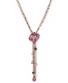 This Y-shaped necklace from Betsey Johnson is a colorful creation that flaunts fuchsia-colored crystal gem clusters, glass pearl bow accents, multi-chains with faceted beads, hematite tone bubble hearts and fuchsia-colored crystal teardrop. Crafted in antiqued gold tone mixed metal. Approximate length: 16 inches + 3-inch extender. Approximate drop: 5-1/4 inches.