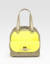 Vibrant python pairs with soft calfskin in a structured top-handle carryall finished with goldtone zipper details.Double top handles, 8 dropOne outside flap and zip pocketProtective metal feetOne inside zip pocketFully lined9½W X 10¼H X 6¼DMade in Italy