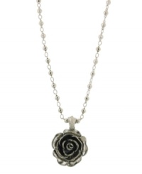 Reign in springtime style with 2028's beautiful bloom. A single flower pendant boasts an intricate design with jet enamel accents. Setting and bead chain crafted in silver tone mixed metal. Approximate length: 16 inches + 3-inch extender. Approximate drop: 1 inch. Reign in springtime style with 2028's beautiful bloom. A single flower pendant boasts an intricate design with jet enamel accents. Setting and bead chain crafted in silver tone mixed metal. Approximate length: 16 inches + 3-inch extender. Approximate drop: 1 inch.