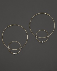 Like magic, smaller hoops balance on 14K gold counterparts. Like magic, smaller hoops balance on 14K gold counterparts.