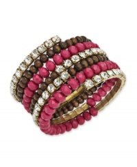 Glitz & glamour meet understated elegance. Add a two-dimensional accessory to your wardrobe with this INC International Concepts' coil bracelet. Featuring pink plastic rondells, glass rhinestone cupchain and wood beads, it's set in mixed metal with 12k gold plating. Bracelet stretches to fit wrist. Approximate diameter: 2-1/4 inches. Glitz & glamour meet understated elegance. Add a two-dimensional accessory to your wardrobe with this INC International Concepts' coil bracelet. Featuring pink plastic rondells, glass rhinestone cupchain and wood beads, it's set in mixed metal with 12k gold plating. Bracelet stretches to fit wrist. Approximate diameter: 2-1/4 inches.